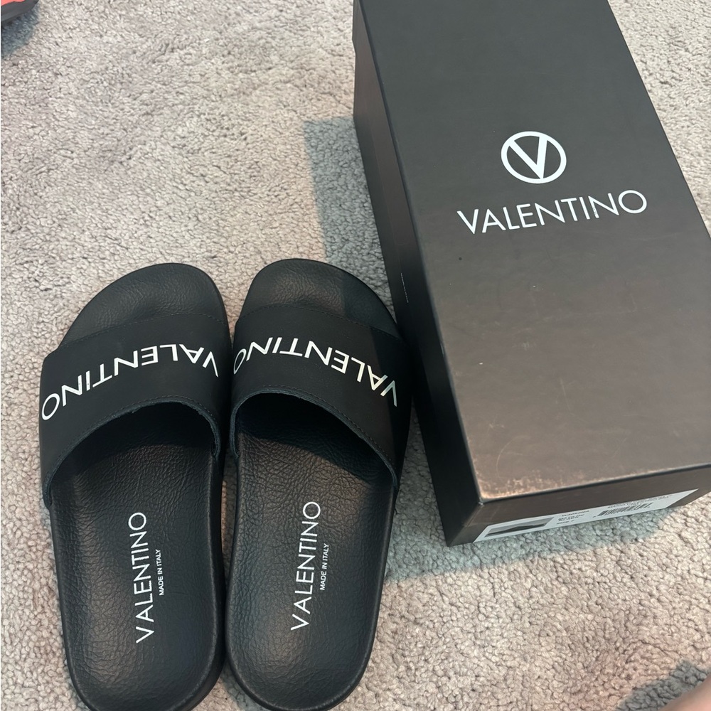 Valentino Black Logo Slides